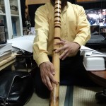 Shimura Zenpo playing shakuhachi at his museum in Osaka