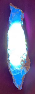 Amber flourescing under UV light. 